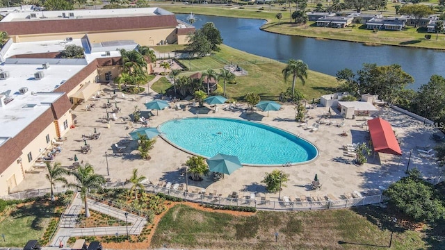 view of pool featuring a water view