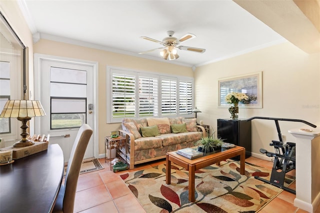 living room with ceiling fan, light tile patterned flooring, and ornamental molding