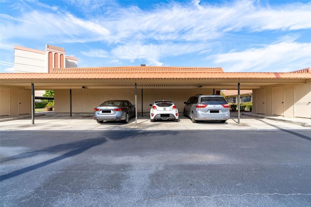 view of car parking featuring a carport