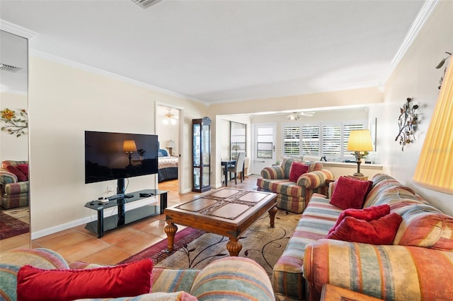 19029 US Highway 19 Unit 25D, Clearwater, FL 33764 - tiled living room with crown molding, visible vents, ceiling fan, and baseboards