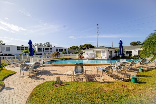 view of swimming pool featuring a patio area