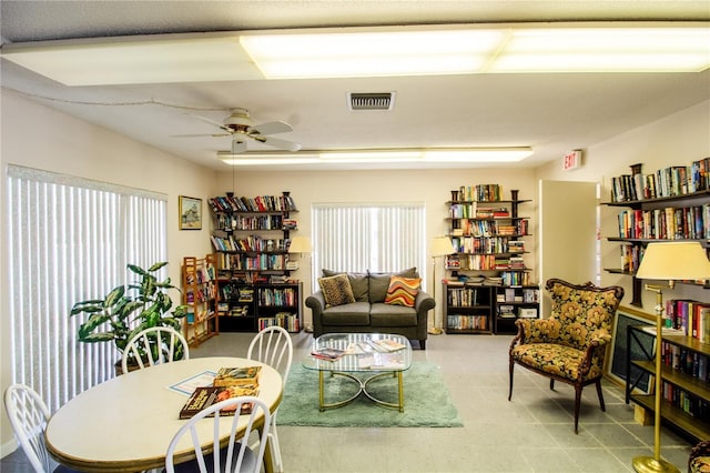 living room featuring ceiling fan