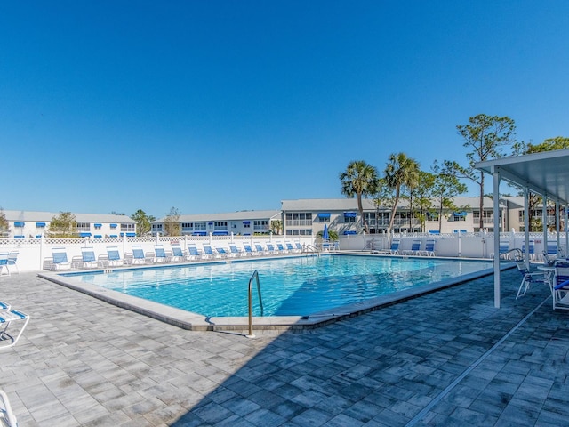 view of pool featuring a patio