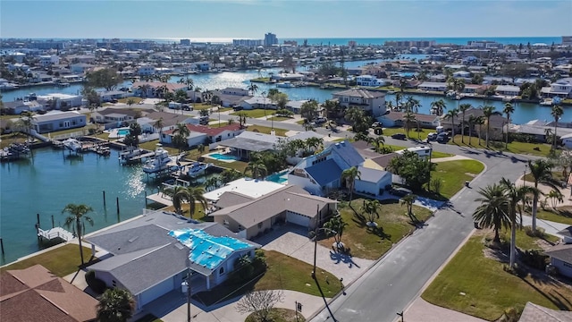 drone / aerial view with a water view