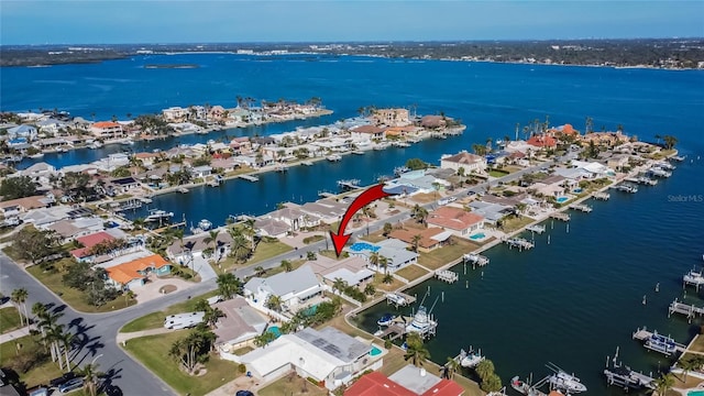 drone / aerial view featuring a water view