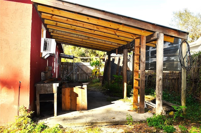 view of patio / terrace with a carport