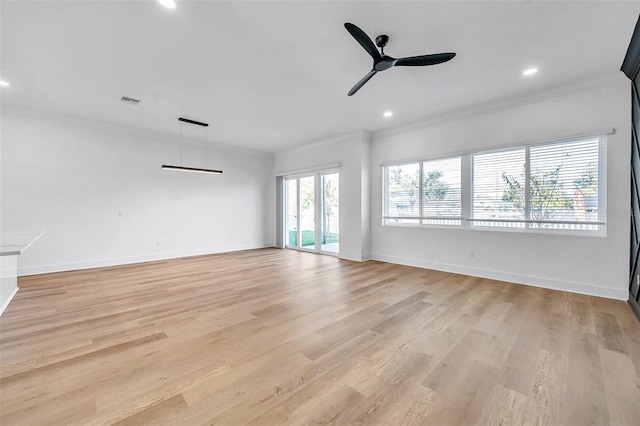 unfurnished room with light hardwood / wood-style floors, ornamental molding, and ceiling fan