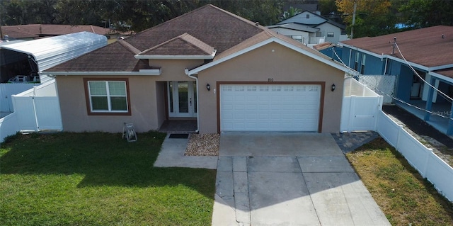 view of front facade featuring a garage and a front yard