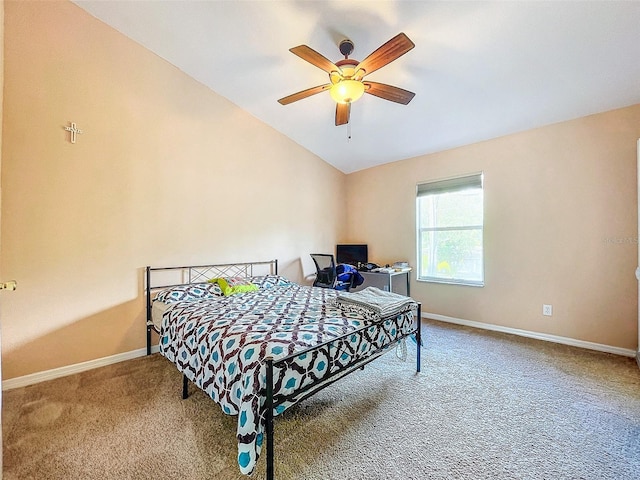 carpeted bedroom with ceiling fan and lofted ceiling