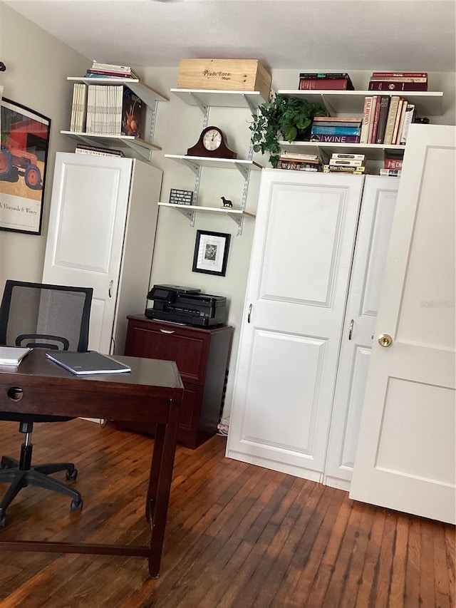 office space with dark hardwood / wood-style flooring