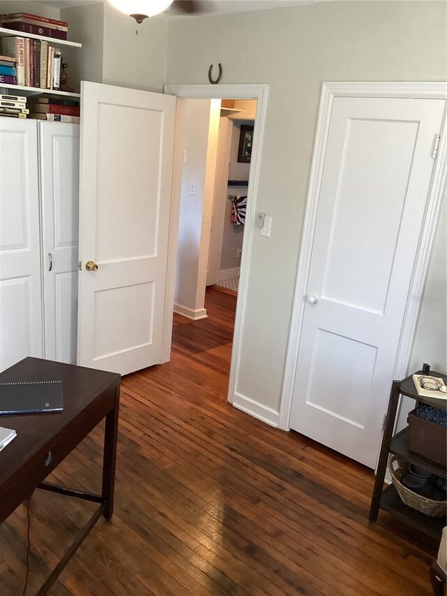 1529 Paloma Ln, Dunedin, FL 34698 - office area with wood-type flooring and baseboards
