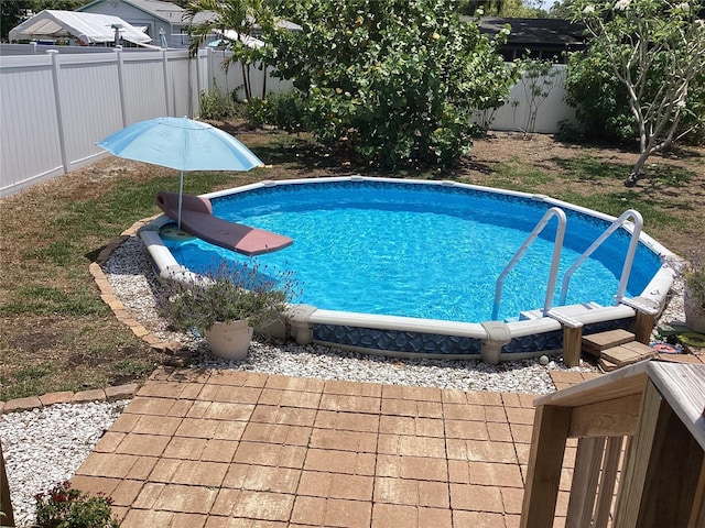 1529 Paloma Ln, Dunedin, FL 34698 - view of pool with a fenced backyard