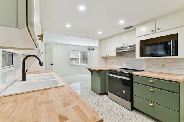 kitchen with stainless steel electric range oven, a sink, white cabinetry, green cabinets, and wooden counters