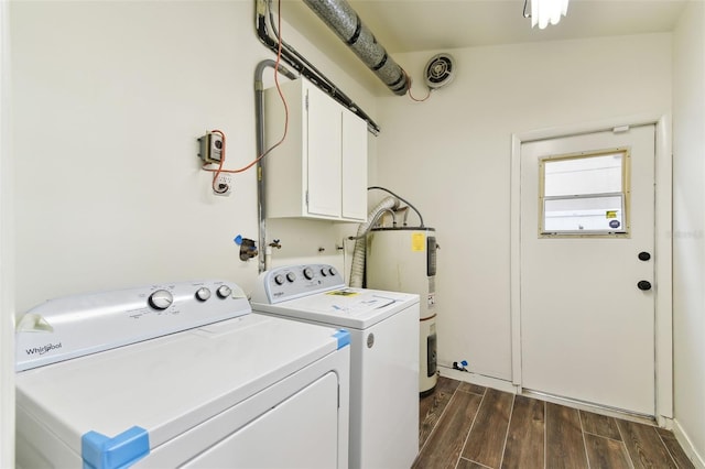 laundry room with cabinet space, visible vents, washer and clothes dryer, wood finish floors, and water heater