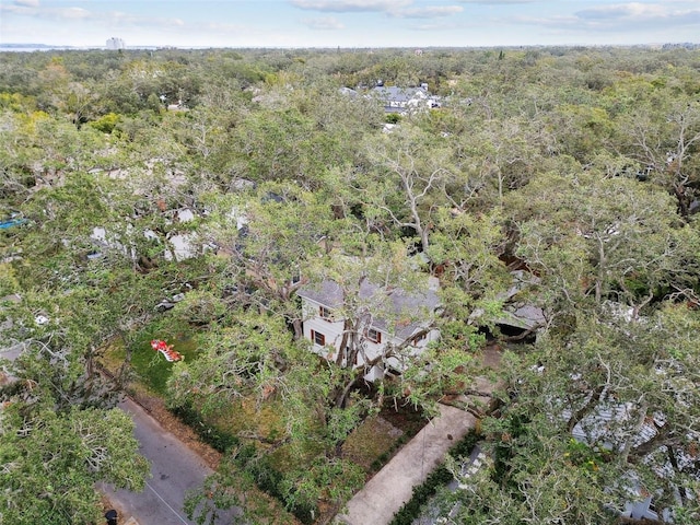 bird's eye view featuring a forest view