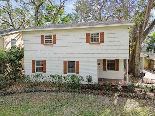 view of front of home with brick siding