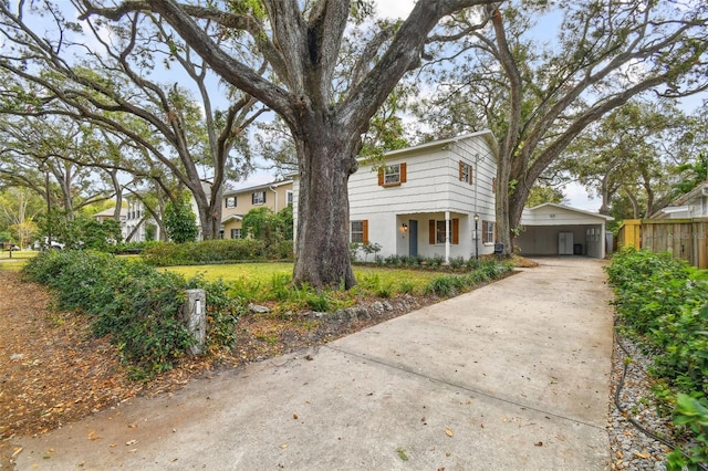 view of front of house featuring fence