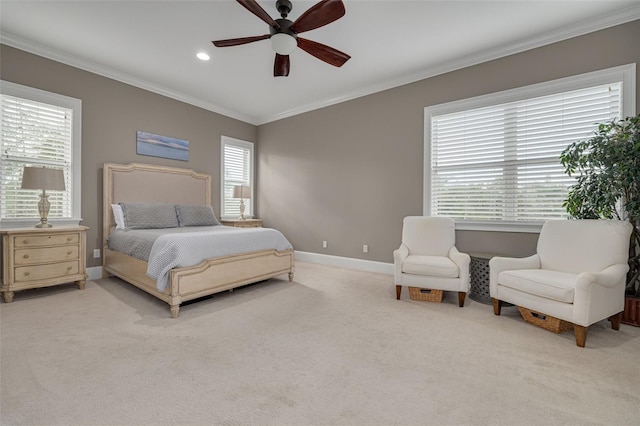 bedroom featuring ceiling fan, light colored carpet, and ornamental molding