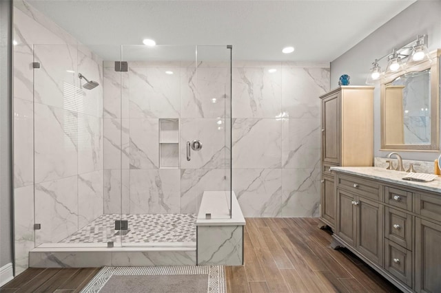 bathroom with vanity and walk in shower