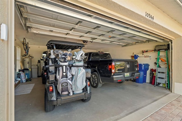 garage featuring water heater