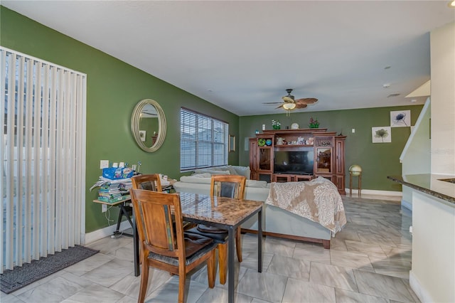 dining area featuring ceiling fan