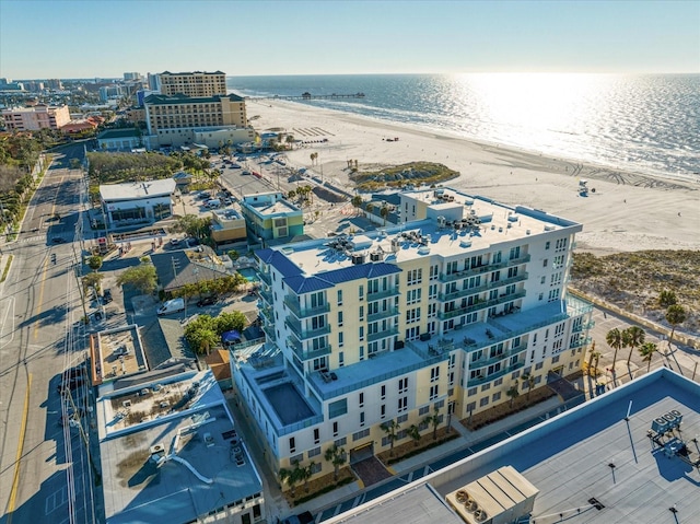 aerial view with a view of the beach and a water view