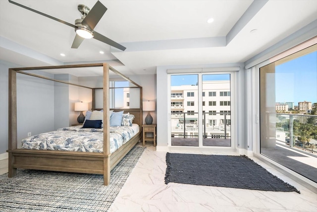 bedroom with access to exterior, multiple windows, and ceiling fan