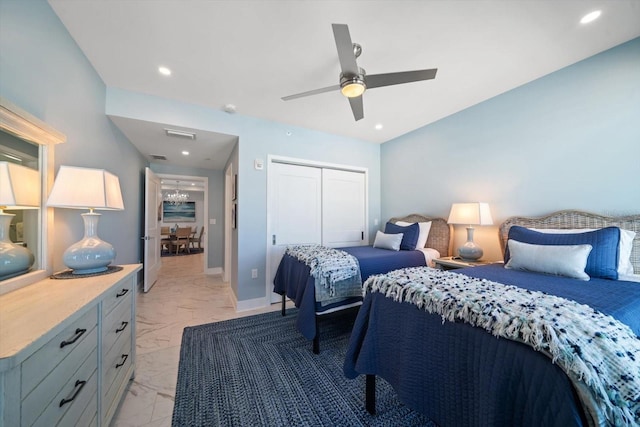 bedroom with a closet and ceiling fan