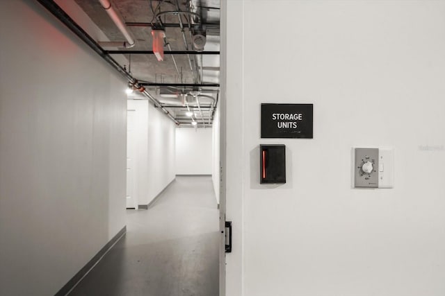 corridor with concrete floors