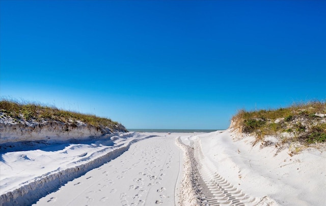 property view of water with a beach view