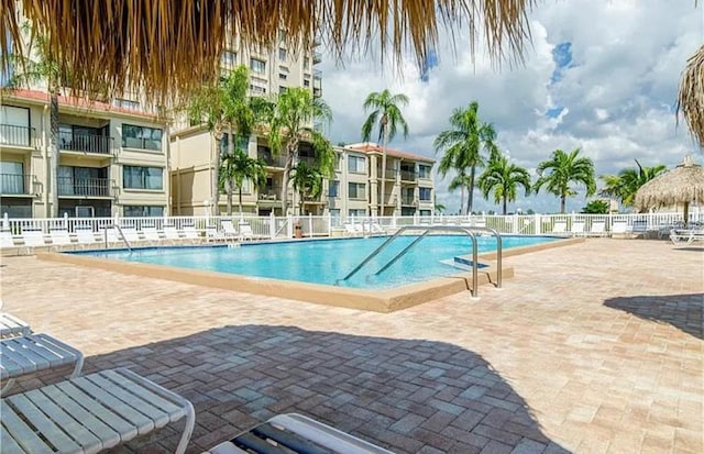 view of pool featuring a patio