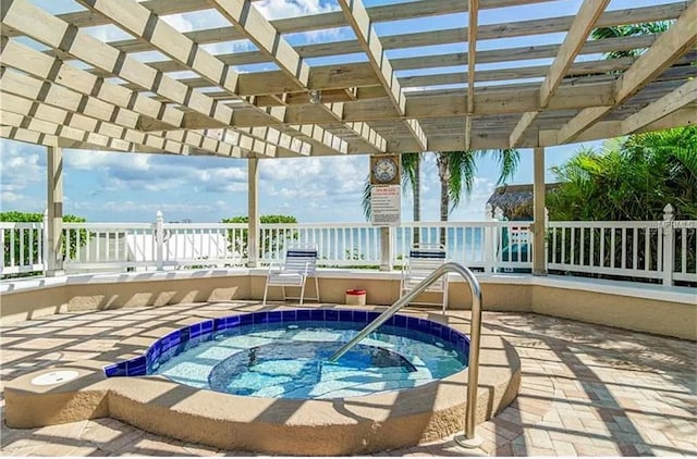 view of pool with a pergola and a community hot tub