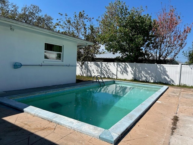 view of pool with fence and a fenced in pool