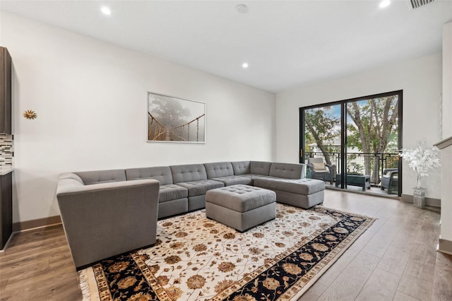 living room with wood-type flooring