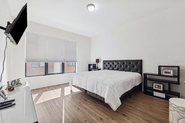 bedroom featuring hardwood / wood-style floors