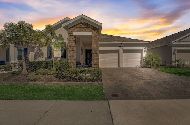 view of front of property with a garage