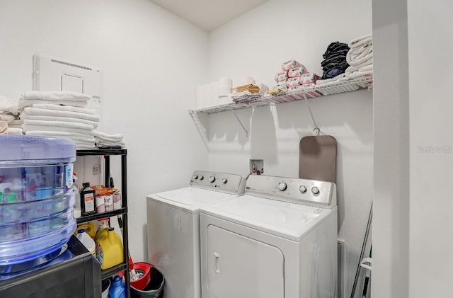 laundry area featuring washing machine and dryer