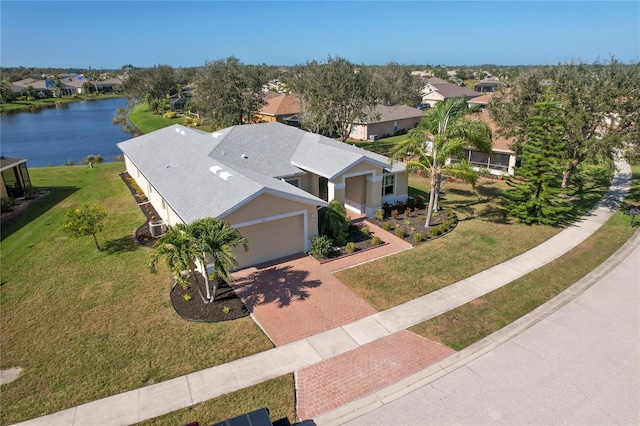 bird's eye view with a water view