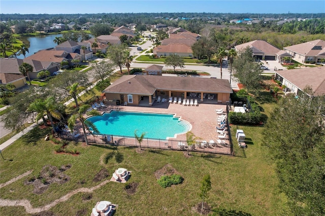 view of swimming pool featuring a water view