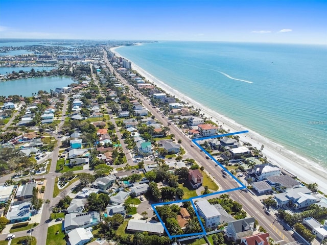 aerial view with a view of the beach and a water view