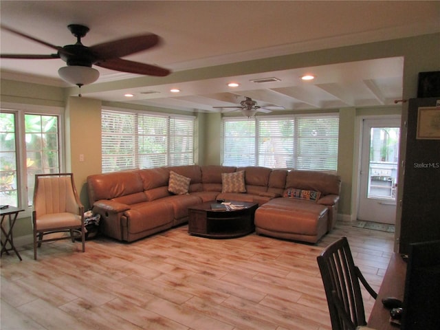 living room featuring light hardwood / wood-style floors and ceiling fan