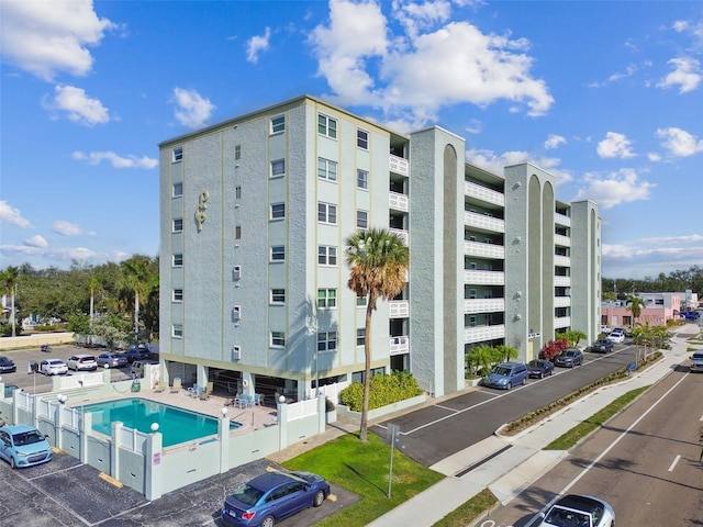 view of property with a community pool