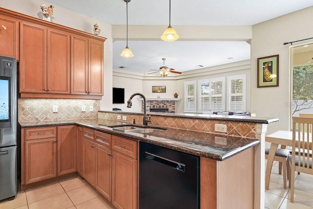 kitchen featuring kitchen peninsula, ceiling fan, sink, and black appliances