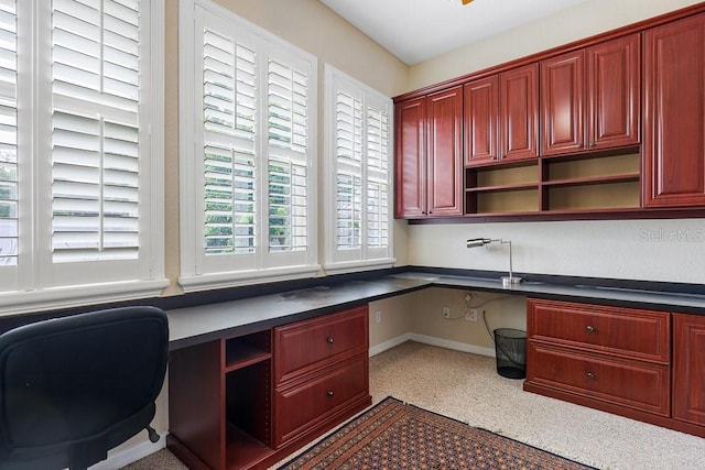 office area featuring built in desk