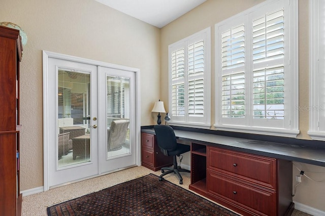 office with french doors and built in desk