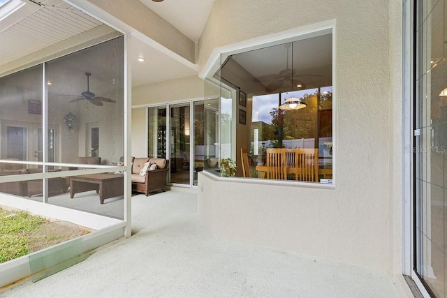 view of patio featuring ceiling fan