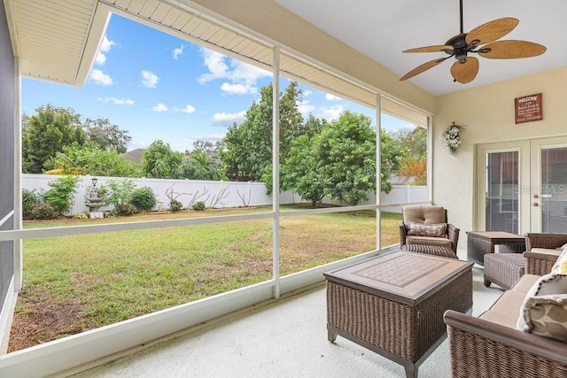 sunroom / solarium with ceiling fan