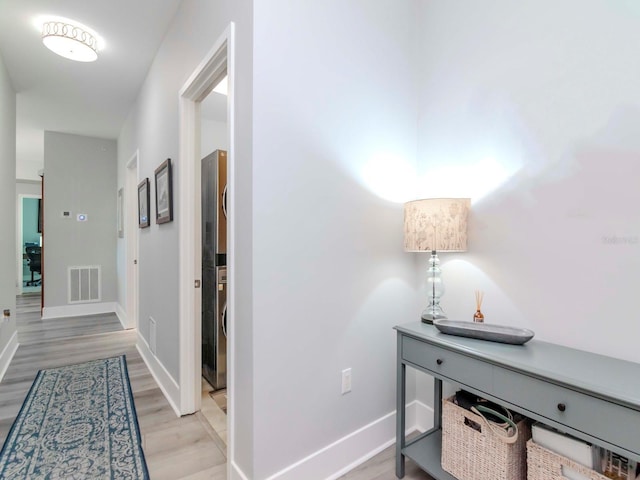 hall featuring light wood-type flooring