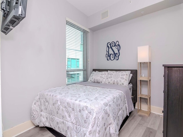 bedroom featuring light hardwood / wood-style flooring