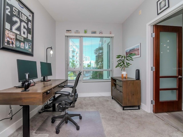 office space featuring light colored carpet